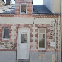 Réfection complete d'une facade en pierre, briques et tuffeau